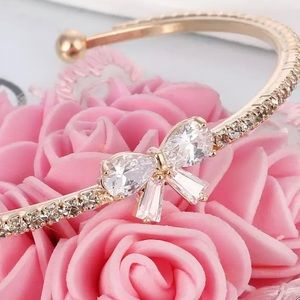 Beautiful golden bow bracelet bangle
